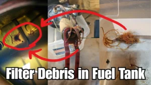 Fuel pump filter sock strainer debris inside fuel tank and removed