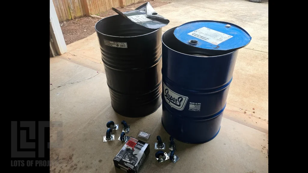 Cut open 55 gallon drums and supplies to make rolling garbage cans